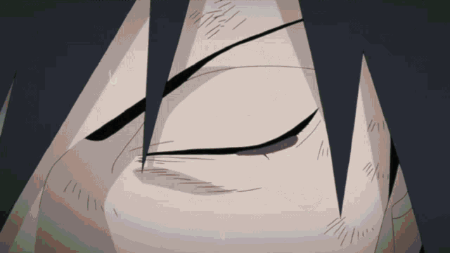 a close up of a person 's eye with a tear running down it
