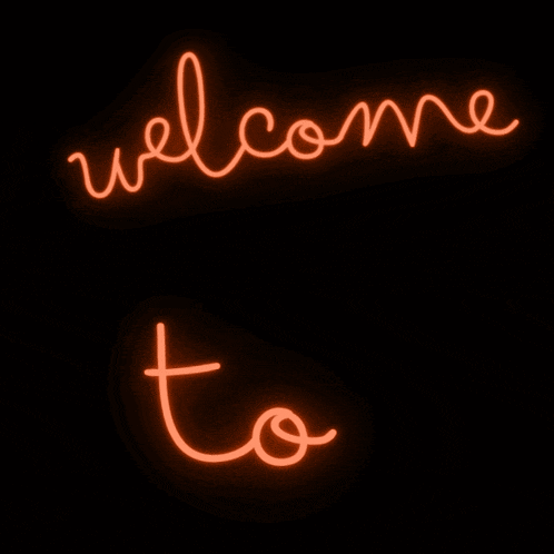 the word cowboys is glowing brightly in orange on a black background