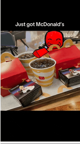 a picture of a mcdonald 's meal with the caption just got mcdonald 's on it