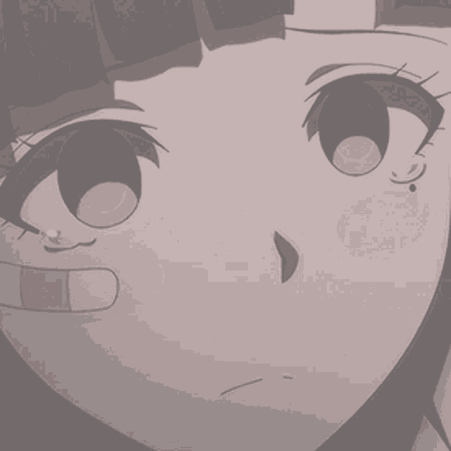a close up of a girl 's face with a bandage on her hand