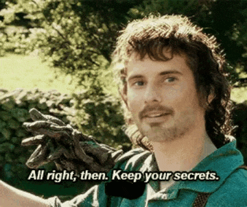 a man in a green shirt is holding a stick and says all right then keep your secrets
