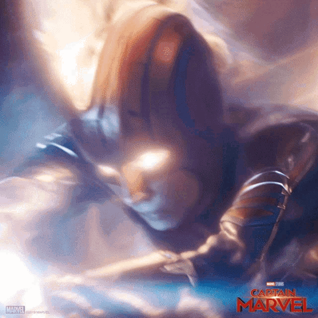 a poster for the movie captain marvel shows a woman in a hood