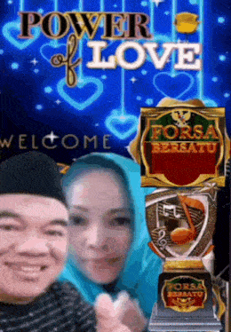 a man and a woman are posing for a picture with the words power of love above them