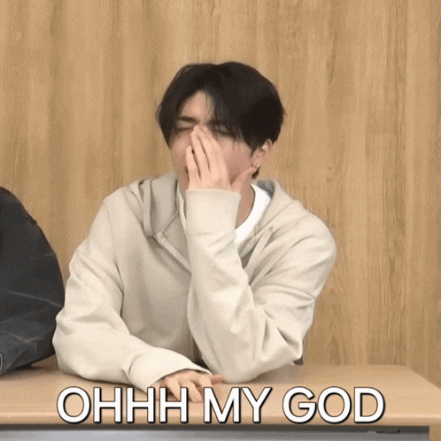 a man covering his face with his hand and the words ohhh my god written on the bottom