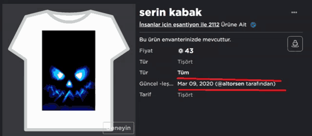 a t-shirt with a picture of a glowing face and the name senin kabak
