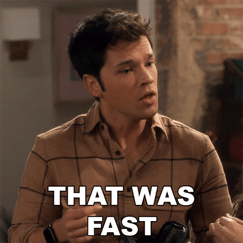 a man in a plaid shirt says that was fast in white letters