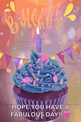 a birthday cupcake with blue frosting and a candle on it