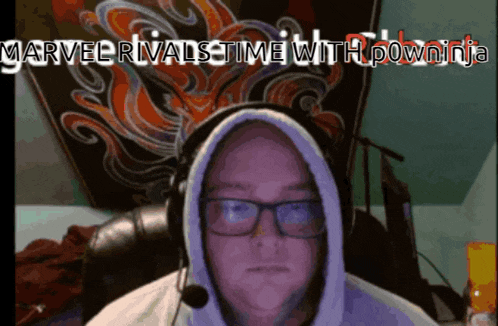 a man wearing headphones and a hoodie says marvel rivals time with powninj