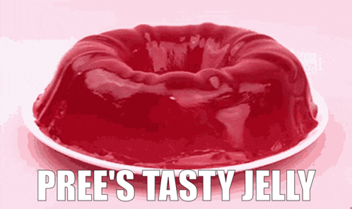 a plate of red jelly with the words pree 's tasty jelly written on it