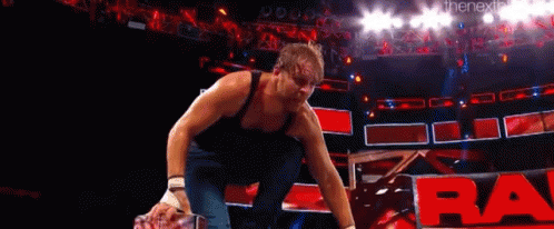 Dean Ambrose Diving GIF - Dean Ambrose Diving Elbow GIFs