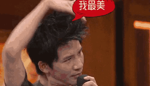 a man is talking into a microphone with a speech bubble that says ' i 'm the best ' .