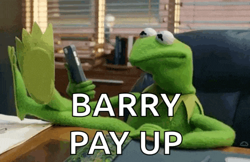 kermit the frog is sitting at a desk looking at a cell phone and saying barry pay up