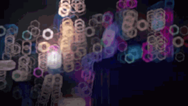 a blurry image of a purple and blue background with circles