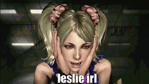 a video game character is covering her ears with her hands and the word leslie is on the bottom