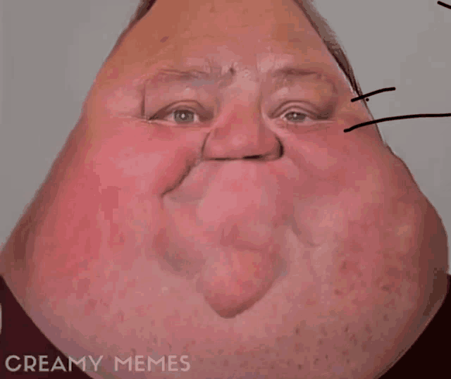 a close up of a man 's face with the words creamy memes on the bottom