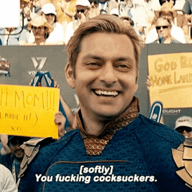 a man holding a sign that says " softly " on it