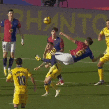 a soccer player with the number 10 on his back is being tackled by another player