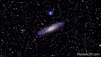 a computer generated image of a galaxy with the website makeagif.com in the lower right corner