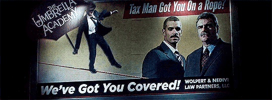 a billboard for the umbrella academy shows two men in suits