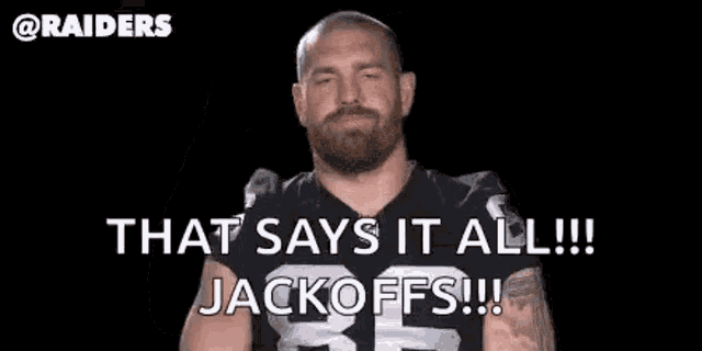 a man with a beard is holding his fist in the air and saying `` that says it all !! jackoffs !!! ''