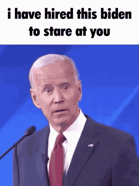 a man in a suit and tie is talking into a microphone with the words i have hired this biden to stare at you