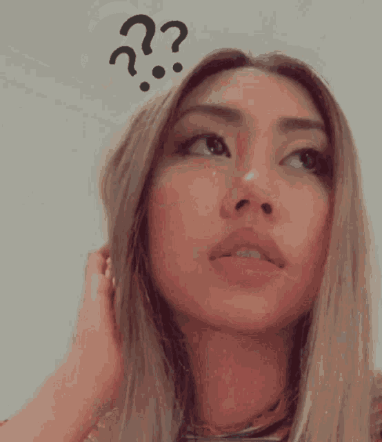a woman has a question mark on her head