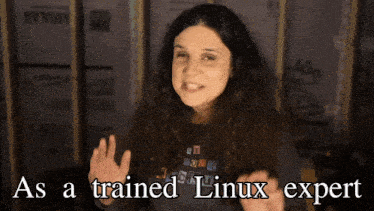 a woman wearing a shirt that says ' as a trained linux expert '