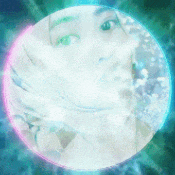 a woman wearing a hijab is surrounded by a circle of light