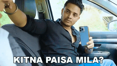 a man is sitting in the back seat of a car taking a picture of himself with a caption that says kitna paisa mila