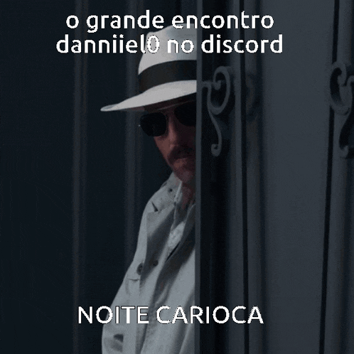a man wearing a hat and sunglasses is standing in front of a door with the words noite carioca on it