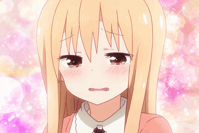 a close up of a girl 's face with tears coming out of her eyes