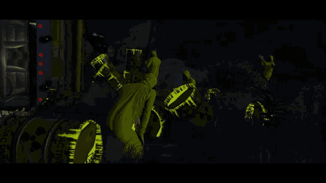 a bunch of yellow barrels with a warning label that says " flammable "