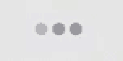 a close up of three circles on a white surface