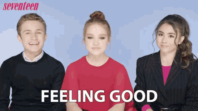 three people are sitting next to each other and the words feeling good are on the bottom
