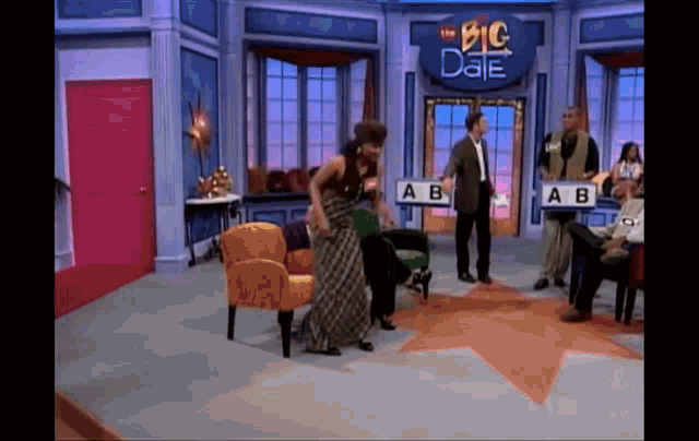 a group of people playing a game called the big date