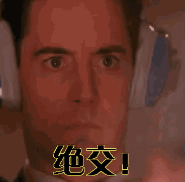 a close up of a man 's face with chinese writing on the bottom