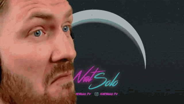 a close up of a man 's face with vat solo written on the bottom right