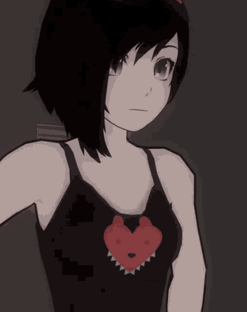a girl in a black tank top with a red heart on her chest
