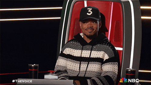 a man wearing a hat with the number three on it