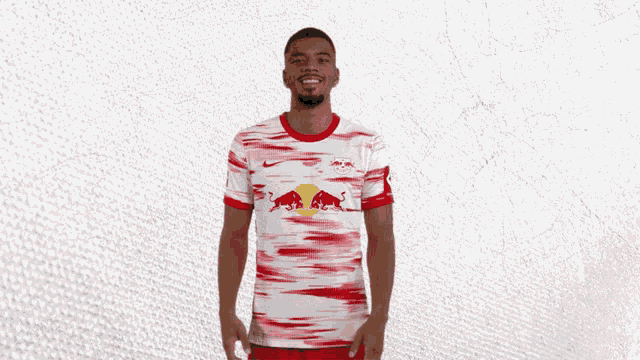 a man wearing a red and white jersey with the number 39 on it