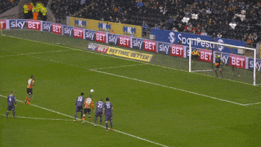 soccer players on a field with ads for sky bet betting better