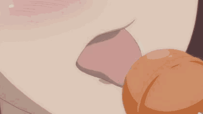 a girl with red hair and a ponytail is eating something with her eyes closed .