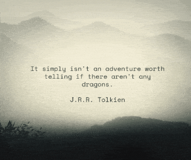 a quote by j.r.r. tolkien is displayed in front of a foggy mountain landscape