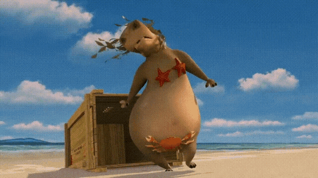 a hippopotamus with a starfish on its chest is standing next to a wooden box on a beach