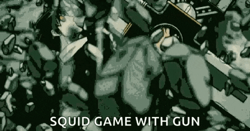 a man is playing a squid game with a gun while laying on the ground .