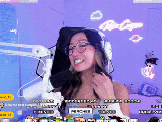 a woman wearing glasses and headphones is on a twitch stream