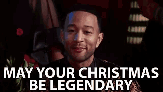 john legend is smiling and says `` may your christmas be legendary '' .