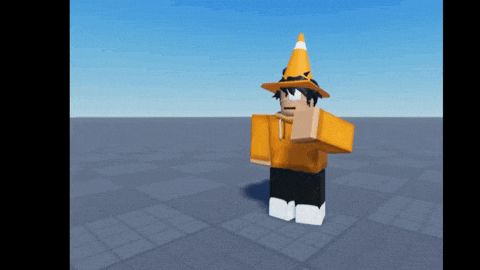 a cartoon character is wearing a yellow witch hat and a yellow shirt .