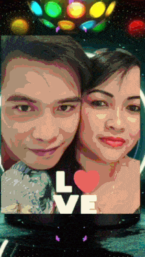 a painting of a man and a woman with the word love in the middle