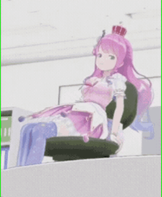 a girl with pink hair and a crown on her head sits in a chair